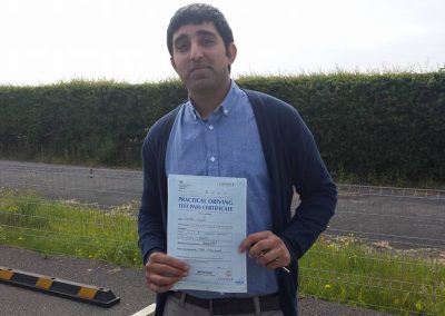 Faisal Iqbal Joiya after passing their driving test with Romeo Driver Training, Chester